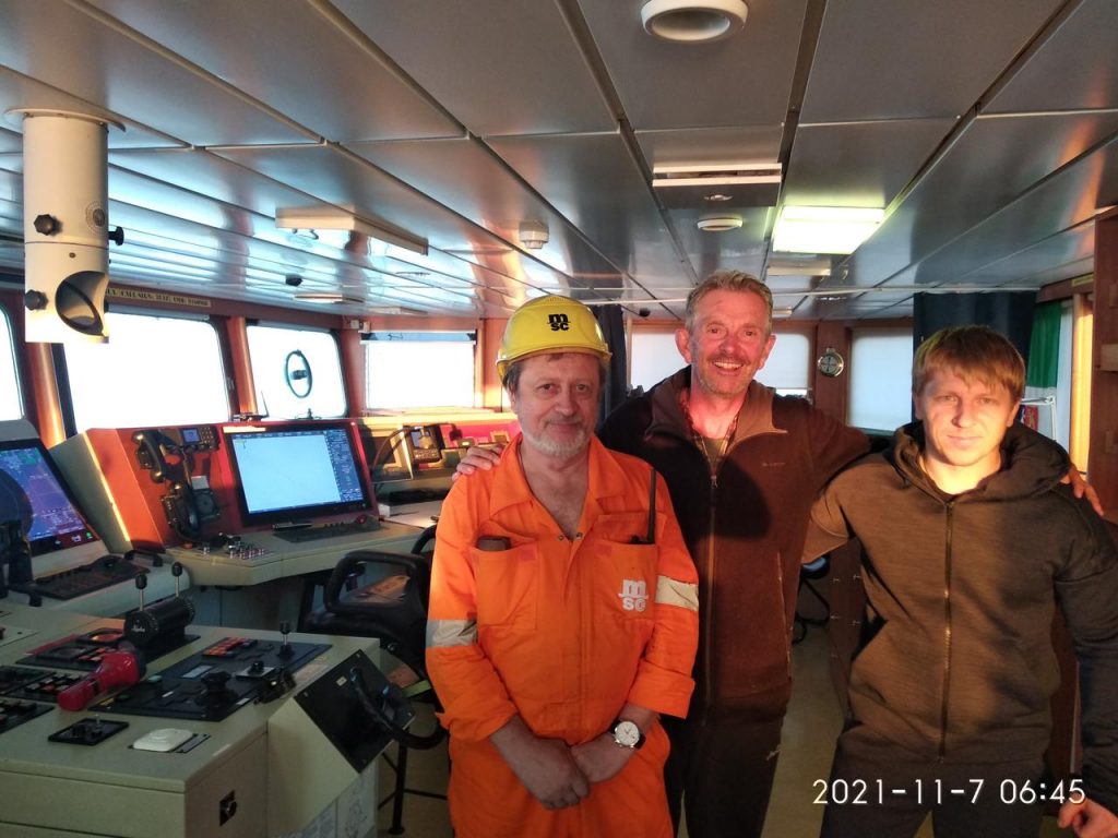 Survivor, Chris Pearsall poses with his rescue team aboard the MSC Sheila