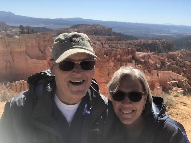 David and his wife enjoying a hike.
